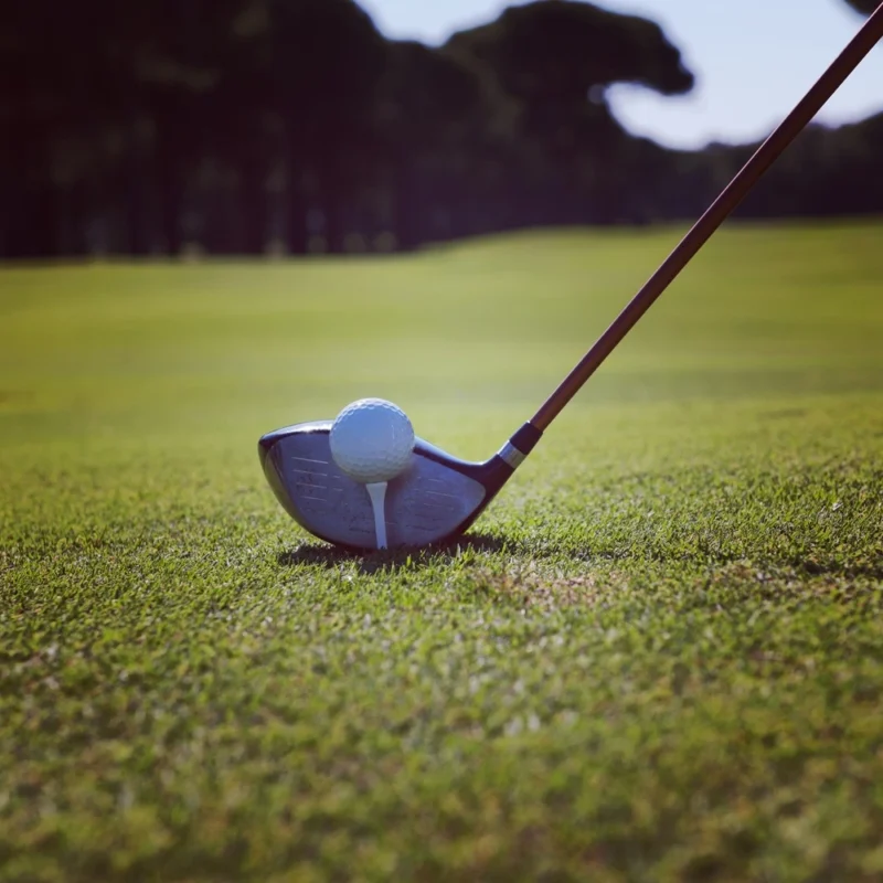 golf player using a 7-wood club